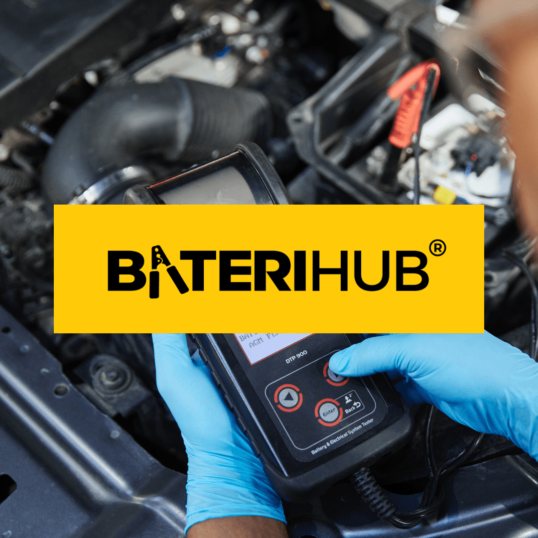 Person changing their car battery